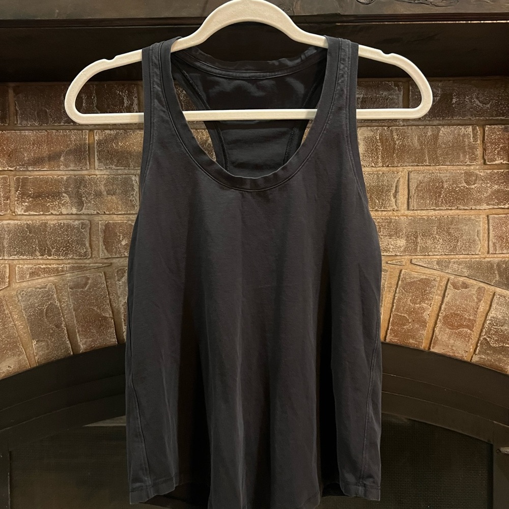 Lululemon love tank. Good used condition. No flaws just a little faded.